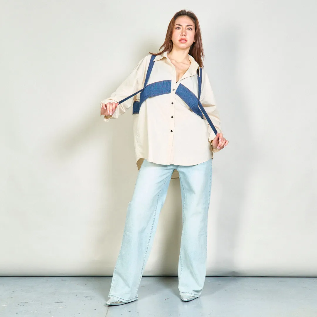 Button-up shirt with denim strap accents wholesale